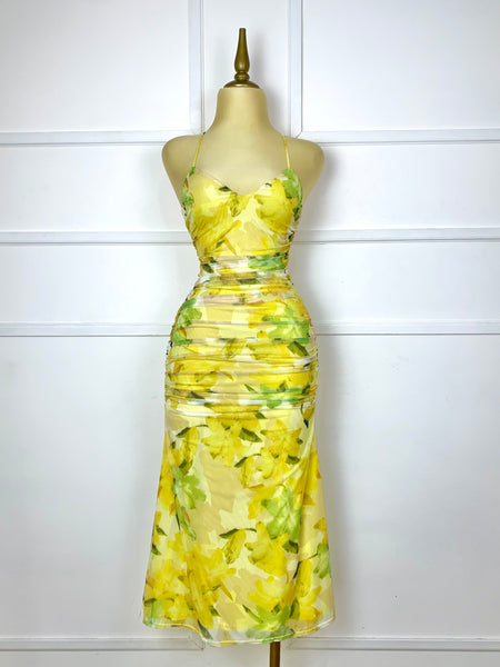 Vestido midi amarillo con flores