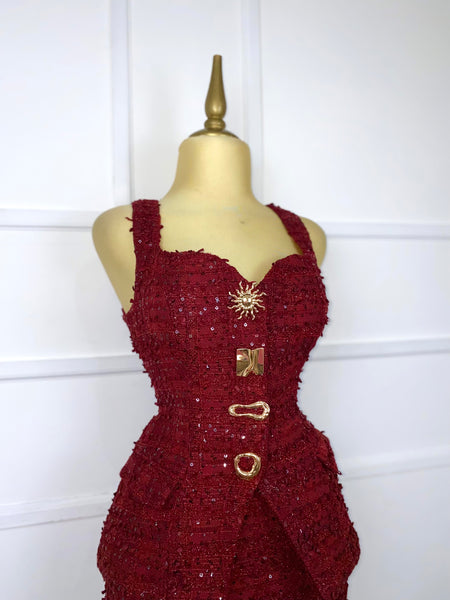 Set tinto tweed con botones dorados