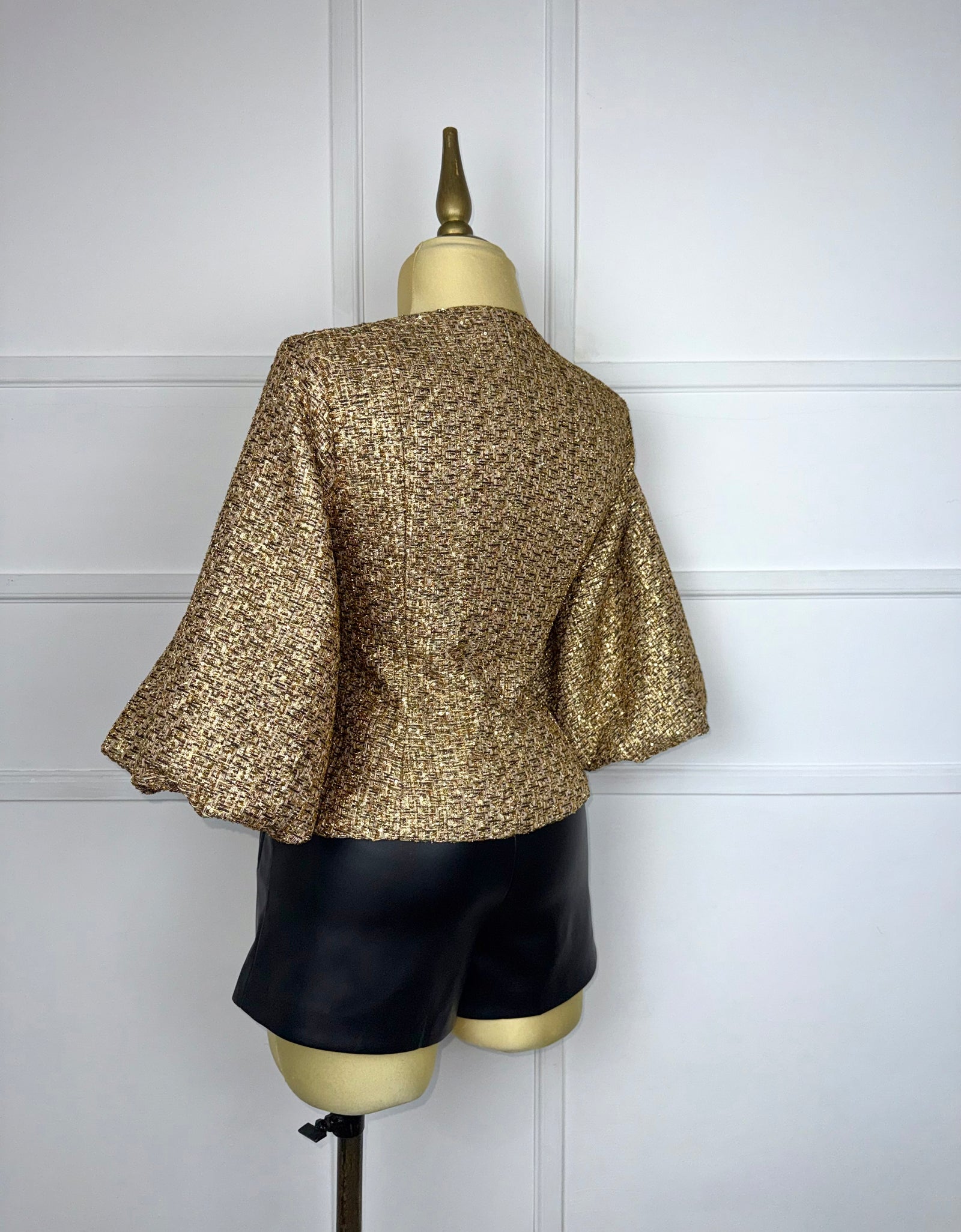 Blusa tweed dorada con botones
