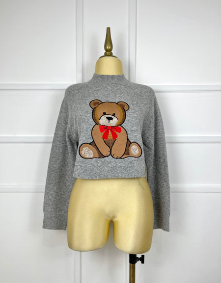 Suéter gris con osito