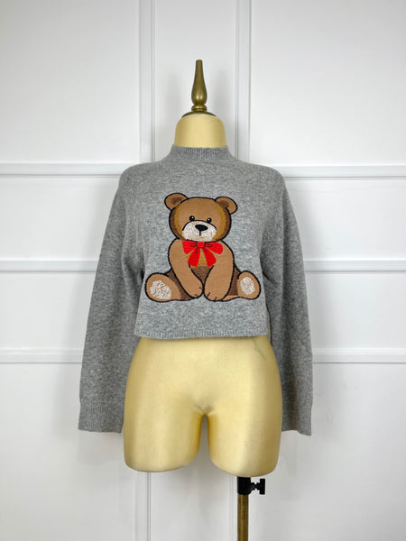 Suéter gris con osito