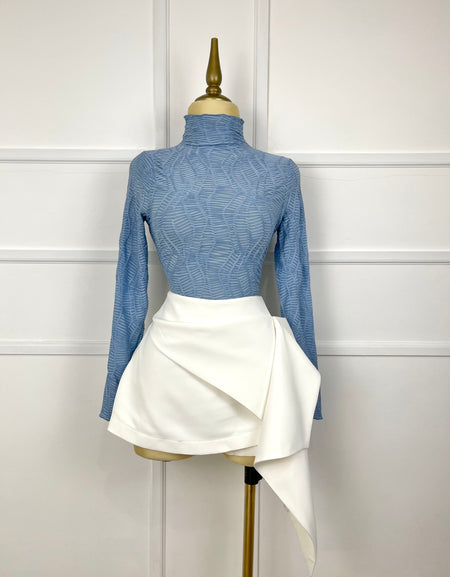 Falda blanca con olán