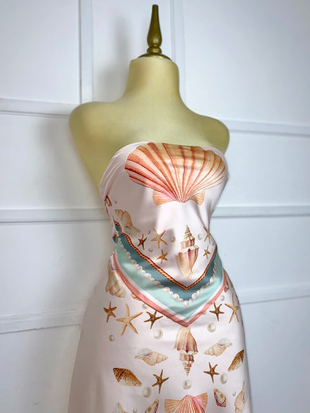 Vestido rosa asimétrico estampado conchas