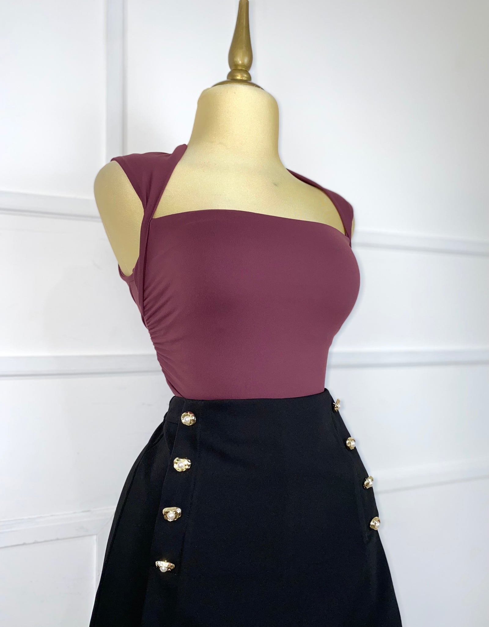 Short falda negro con botones