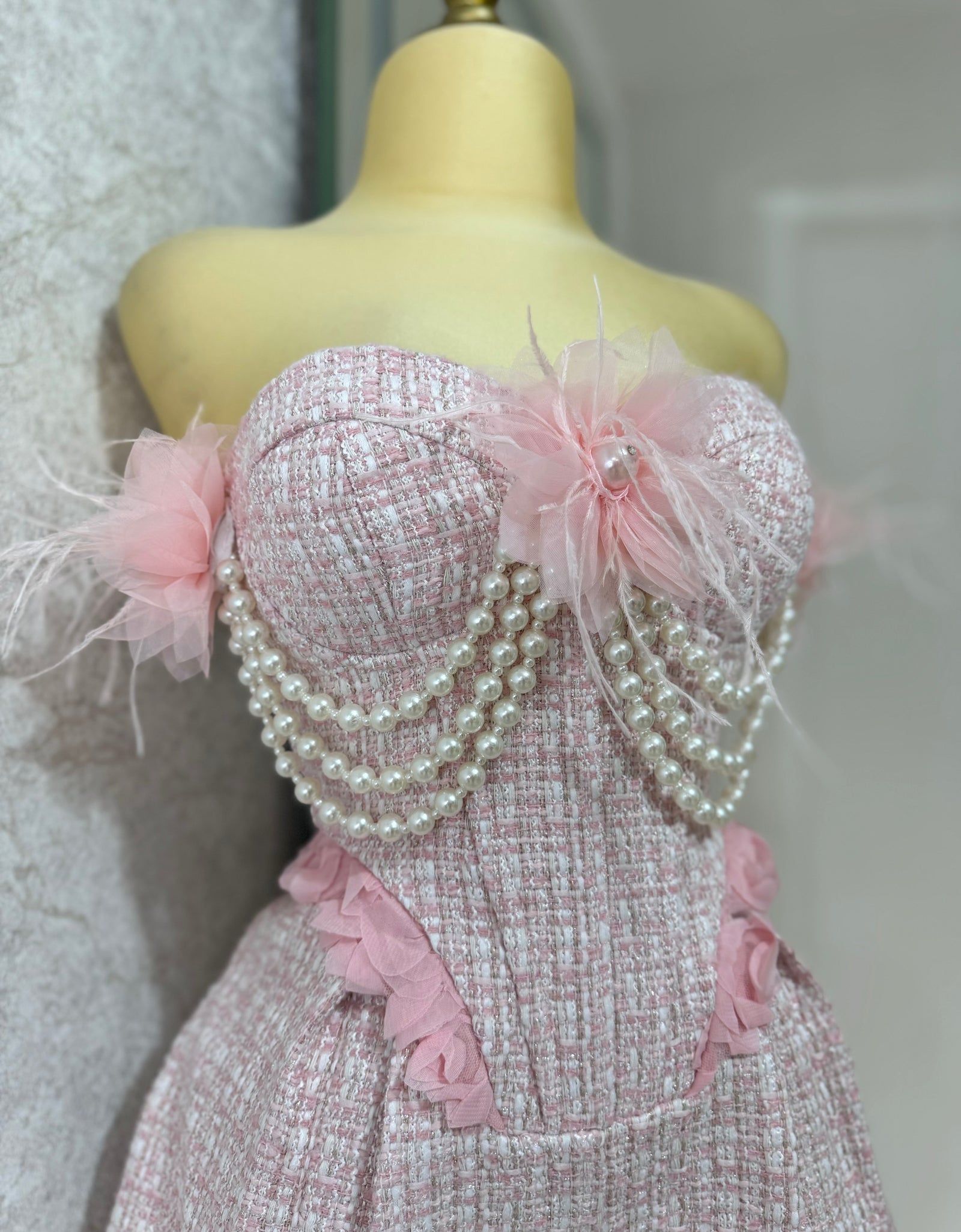 Jumper rosa tweed con perlas