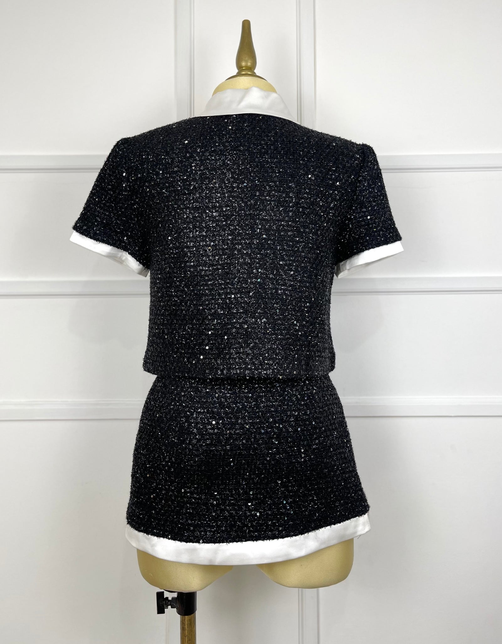 Set negro tweed brilloso botones pedrería