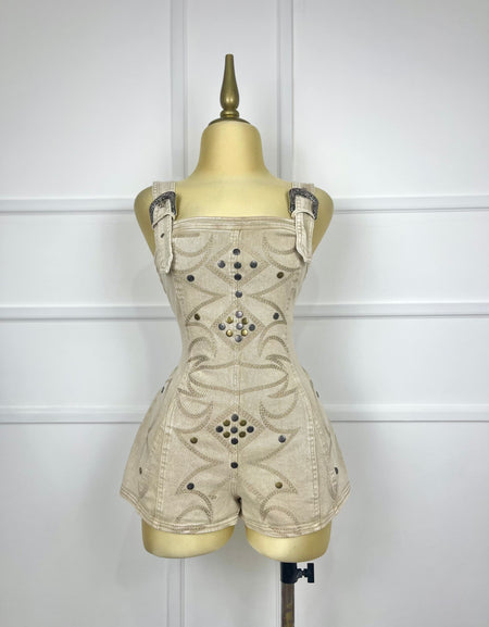 Jumper de mezclilla con hebillas