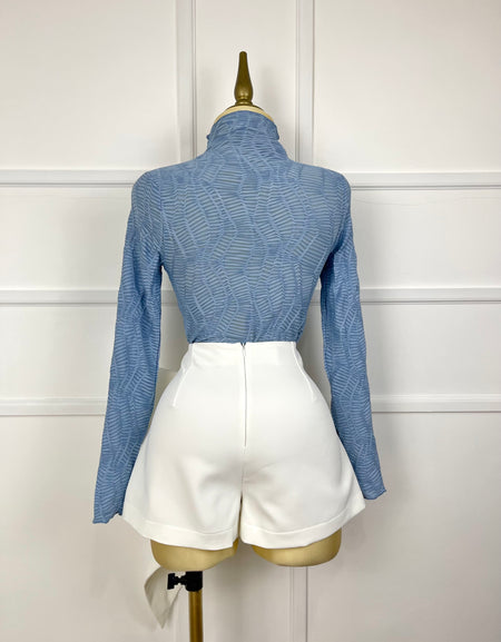 Falda blanca con olán