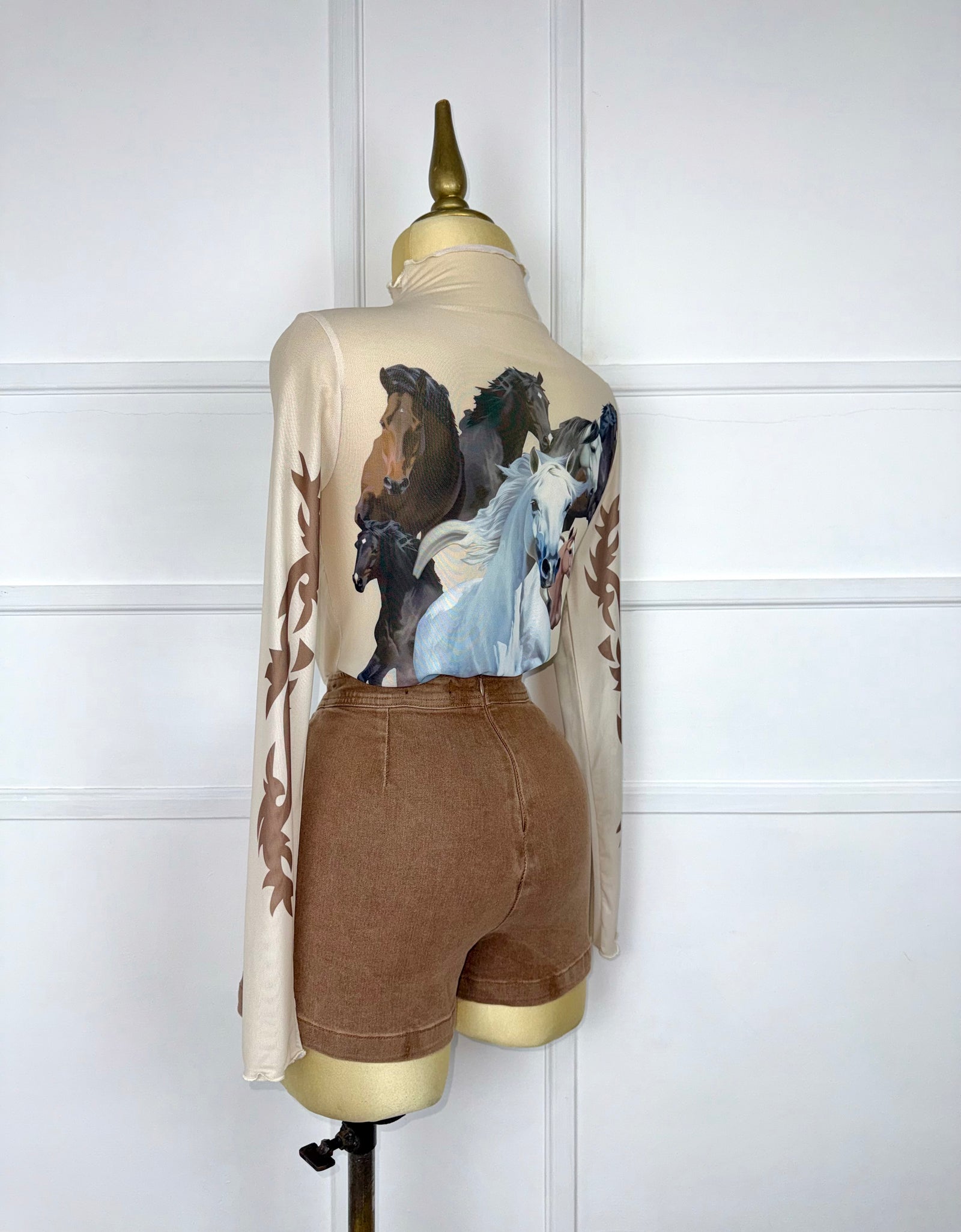 Blusa mesh estampado caballos