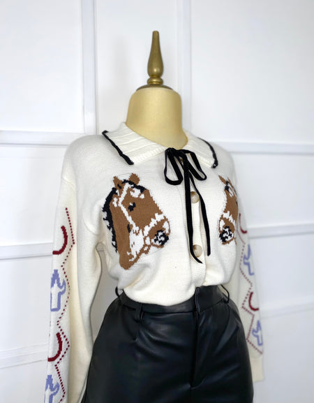 Suéter estampado caballos con listones