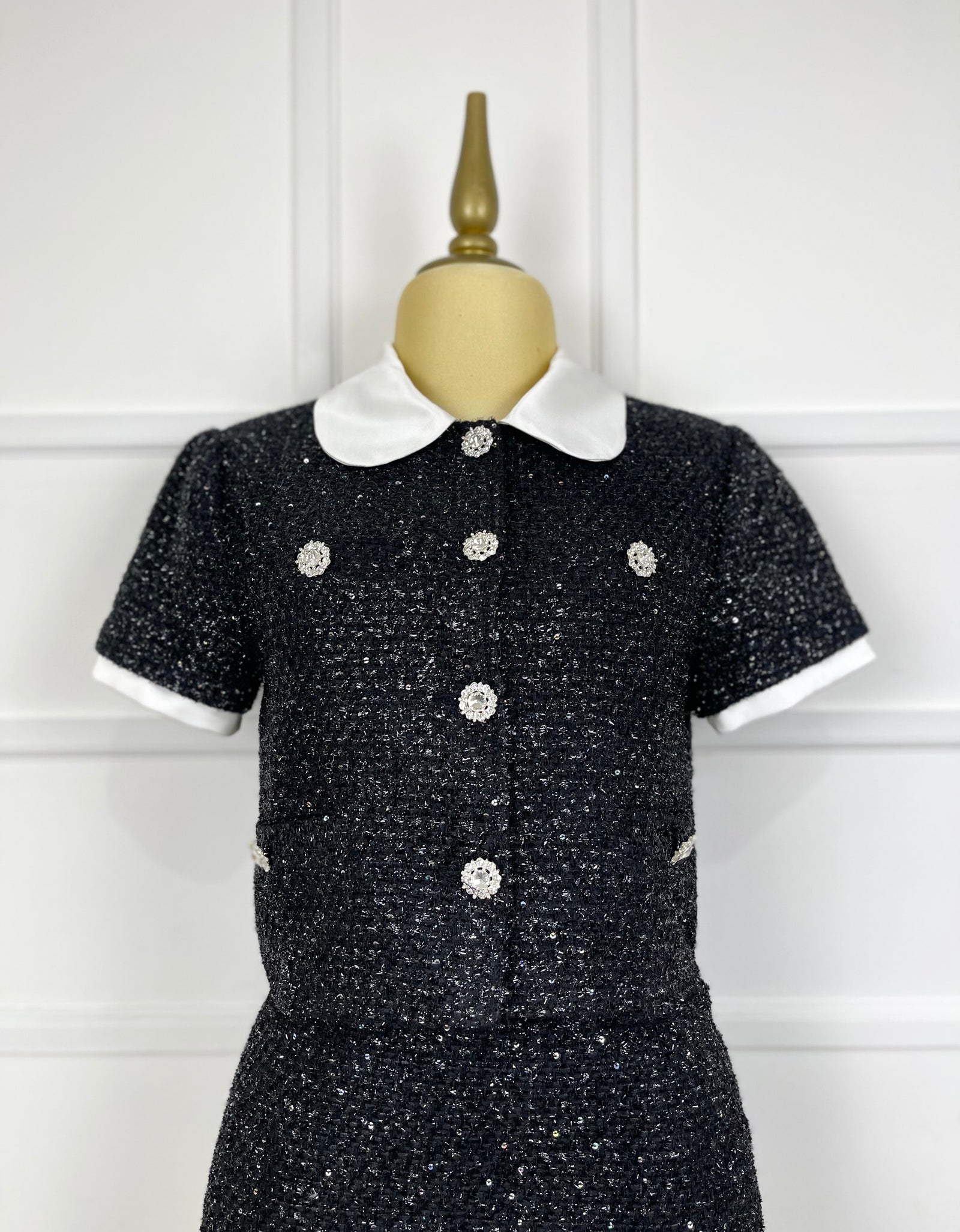 Set negro tweed brilloso botones pedrería
