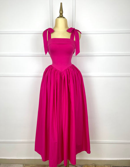 Vestido rosa fucsia midi con listones