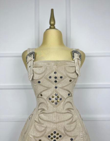 Jumper de mezclilla con hebillas