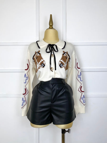 Suéter estampado caballos con listones