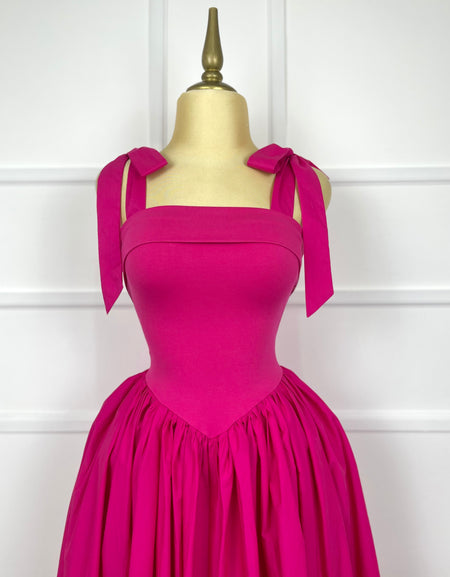 Vestido rosa fucsia midi con listones