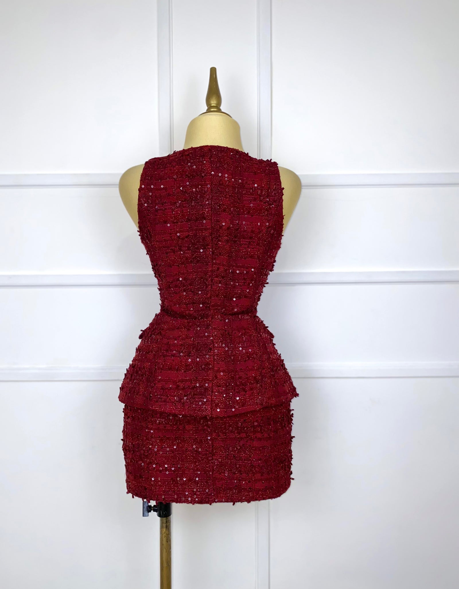 Set tinto tweed con botones dorados