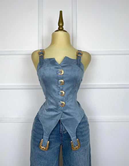 Blusa azul gamuza con hebillas