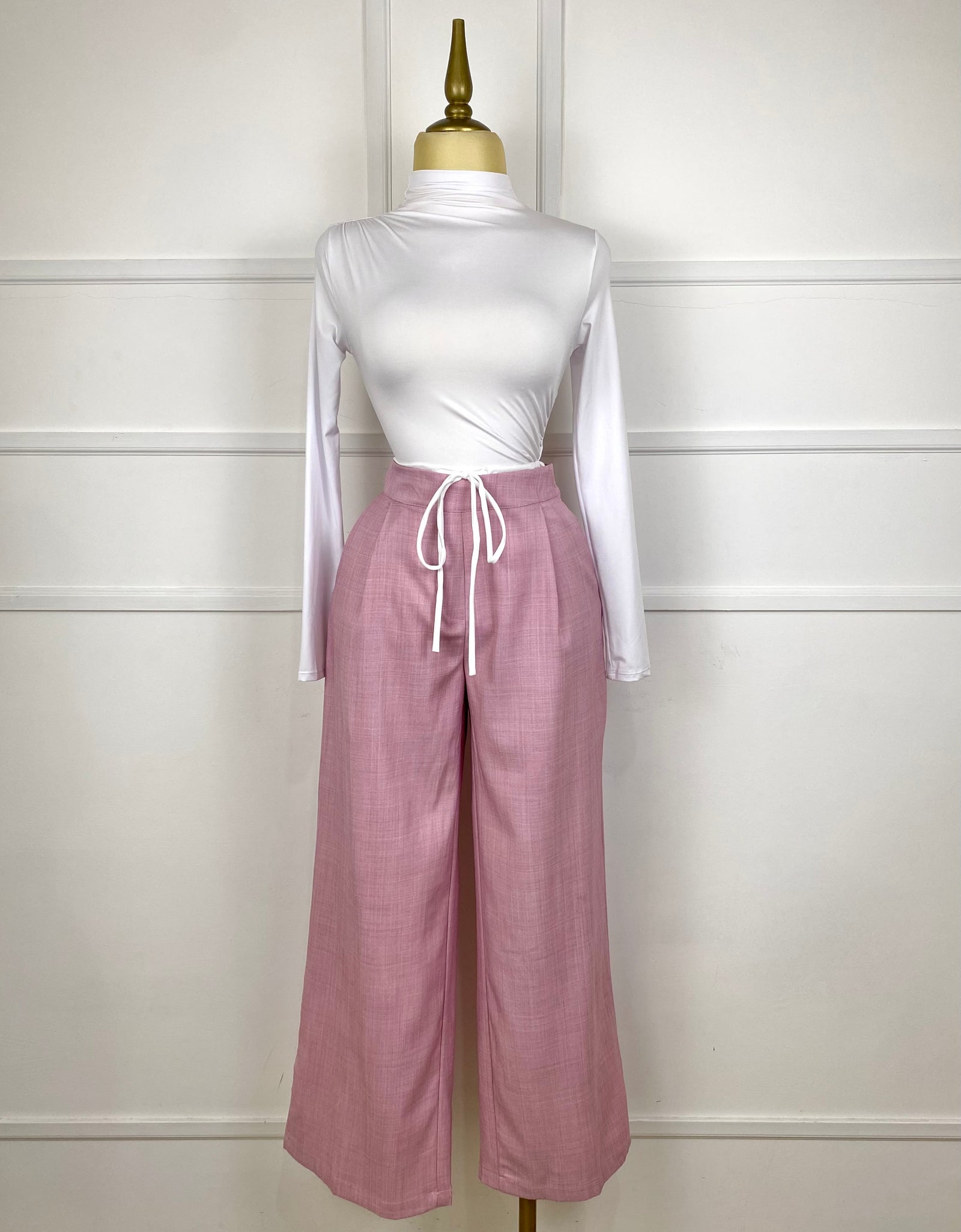 Pantalón rosa con listón
