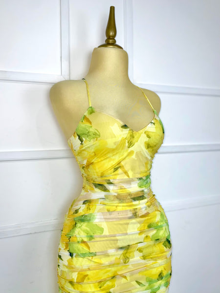 Vestido midi amarillo con flores