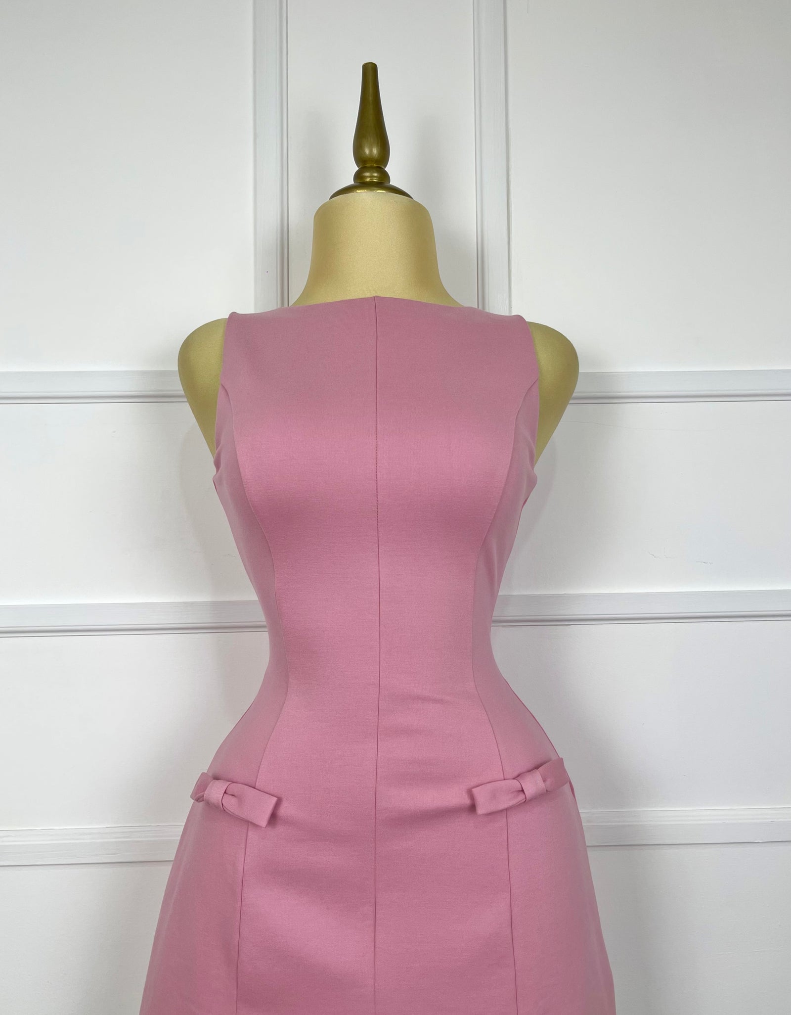 Vestido rosa corte A con 2 moñitos