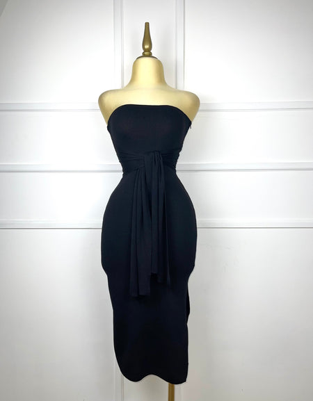Vestido negro de punto stretch con abertura