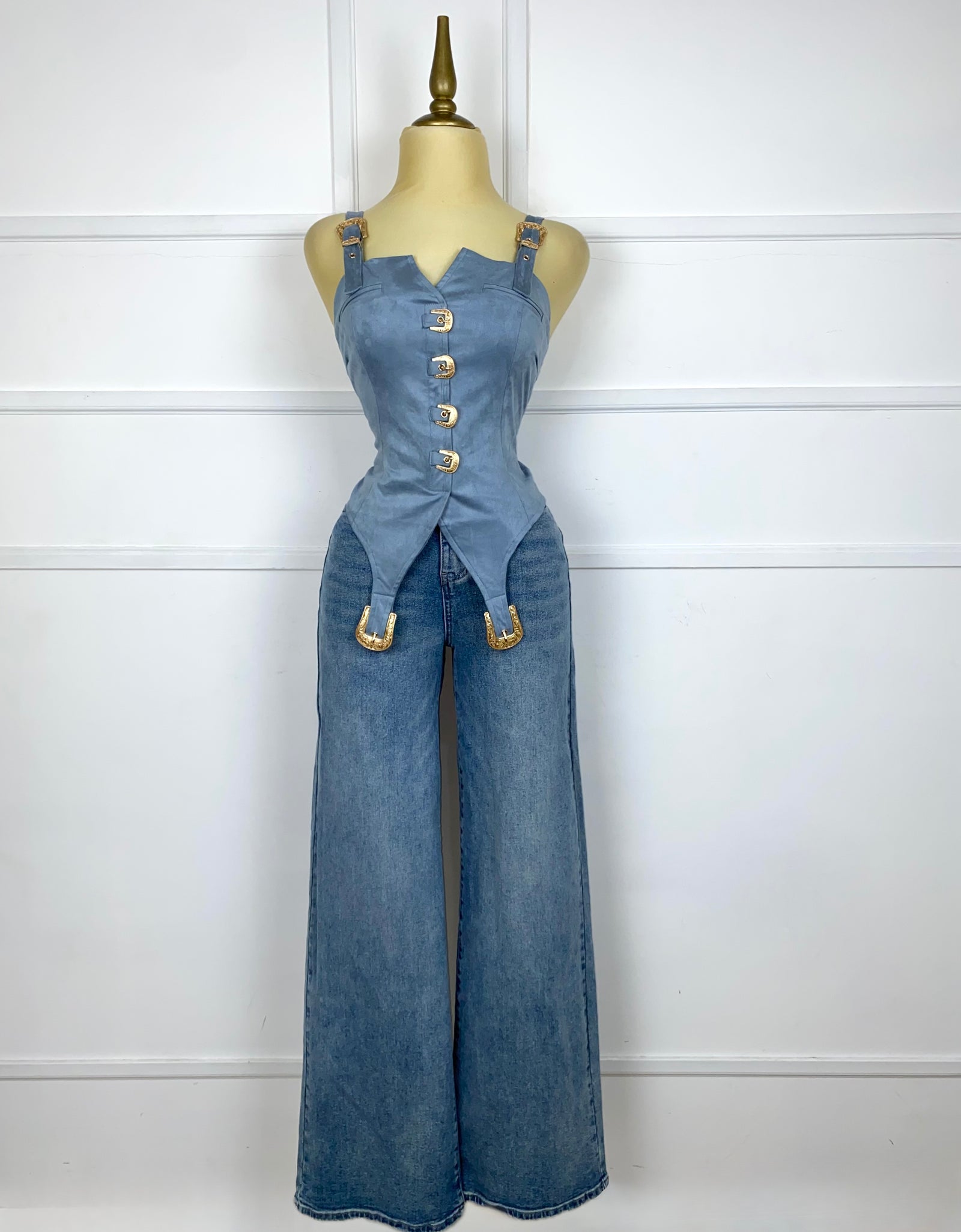 Blusa azul gamuza con hebillas