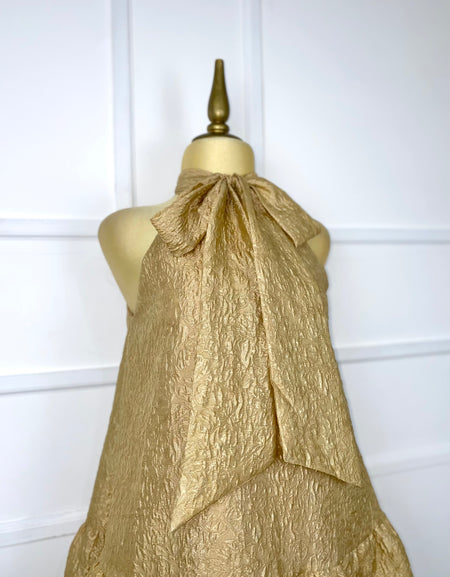 Vestido dorado con listón