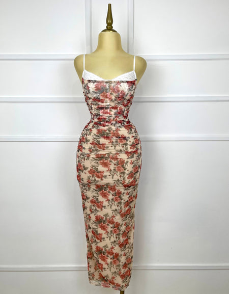 Vestido drapeado con flores rojas