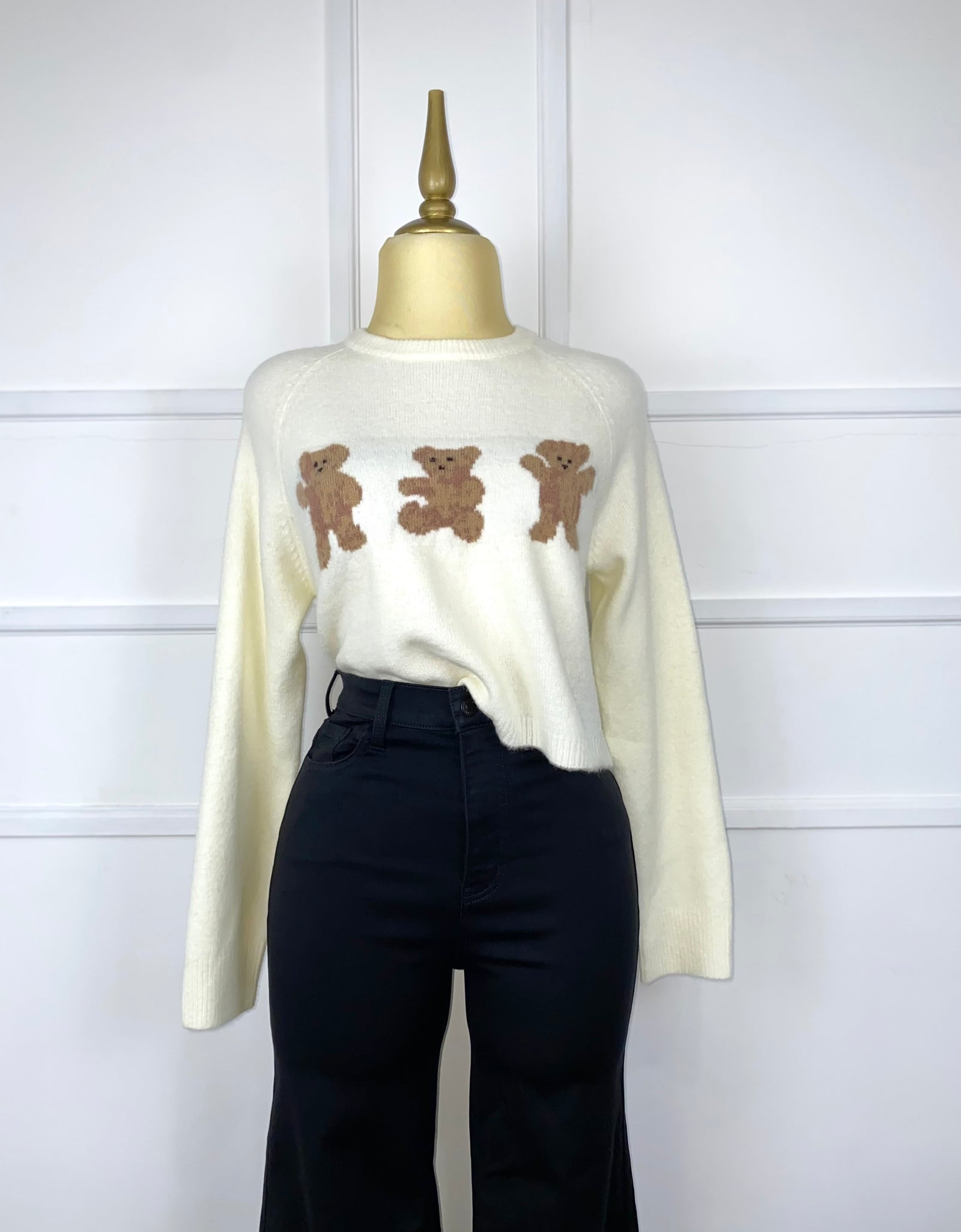 Suéter beige con ositos