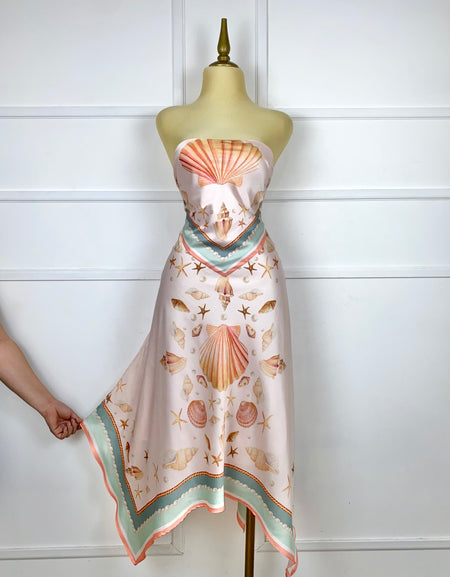 Vestido rosa asimétrico estampado conchas