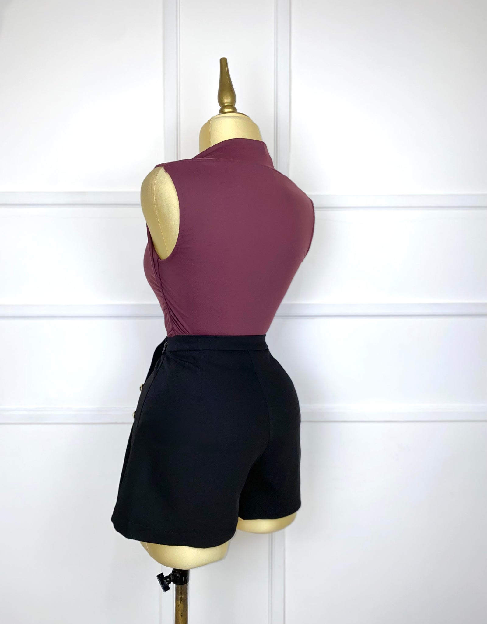 Short falda negro con botones