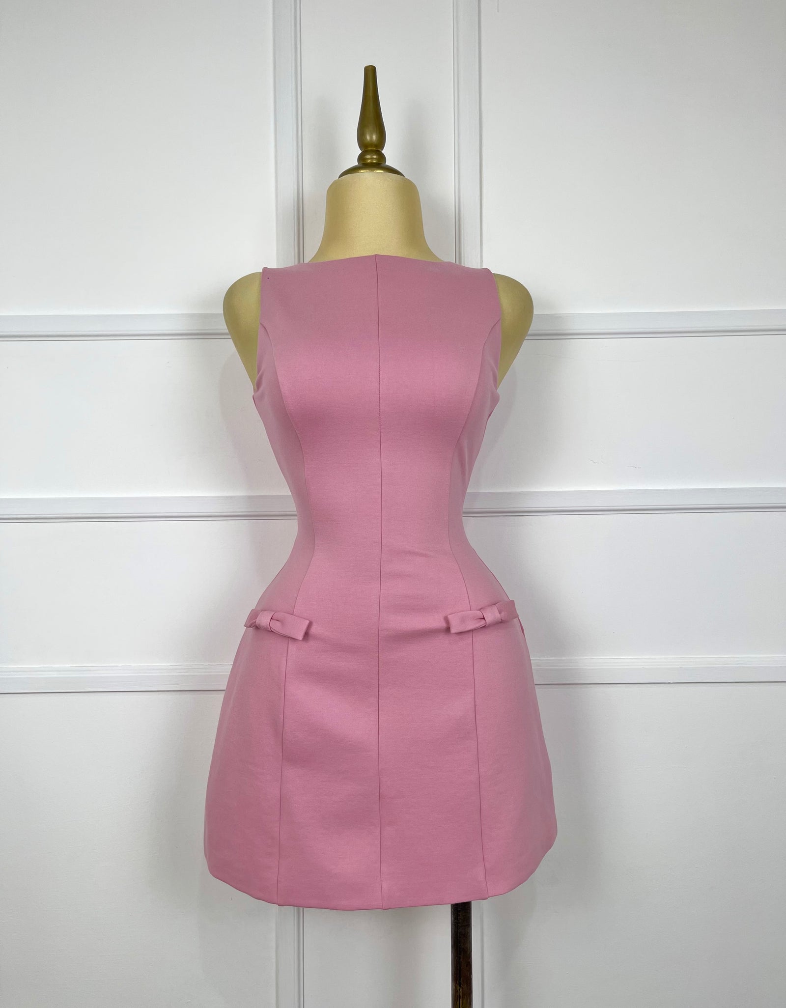 Vestido rosa corte A con 2 moñitos