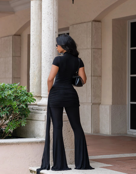 Set negro lycra con olán