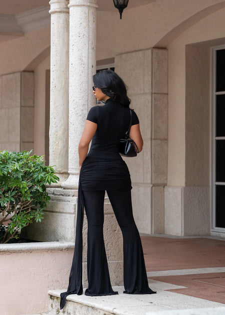 Set negro lycra con olán