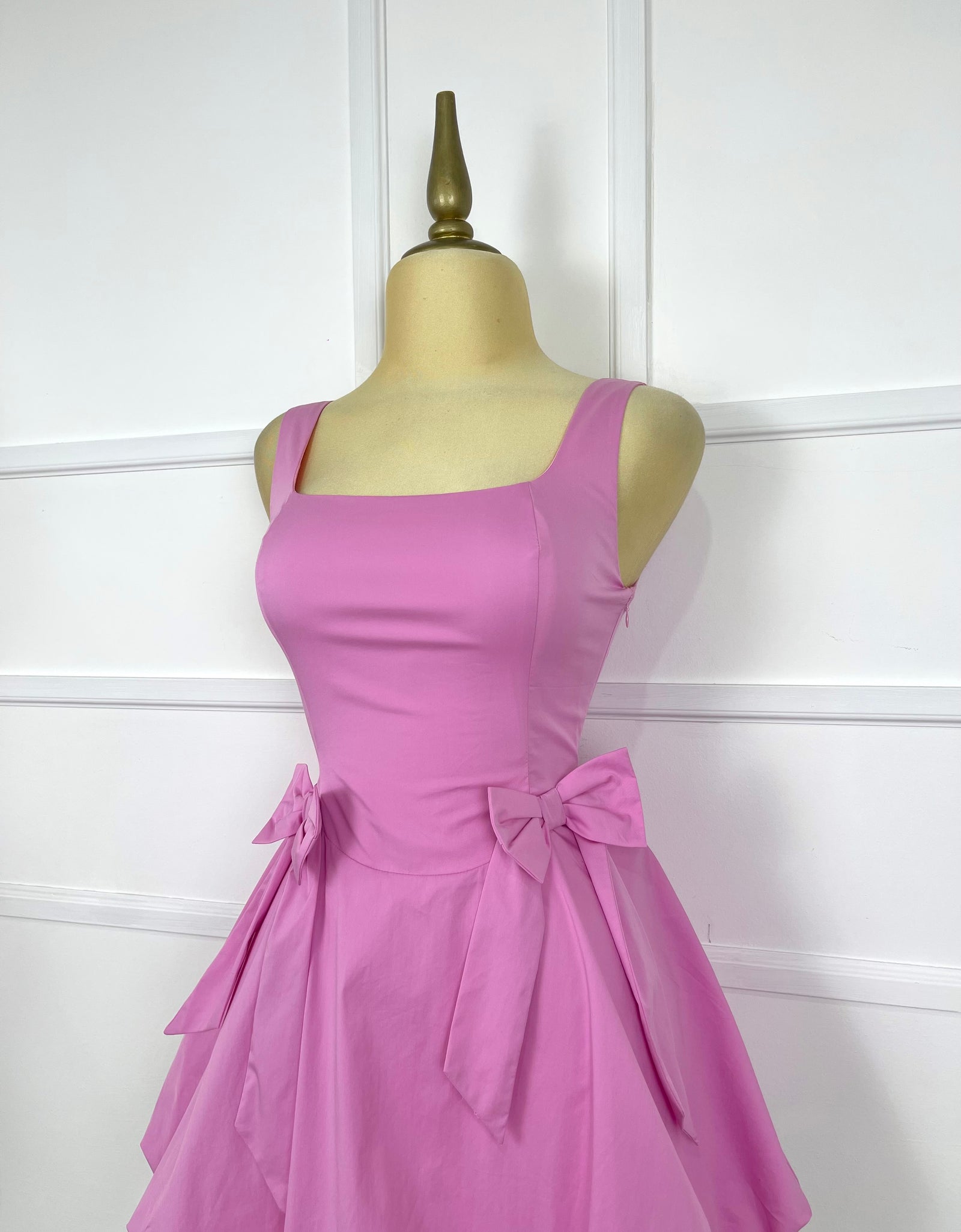 Vestido rosa bombacho con 2 moñitos