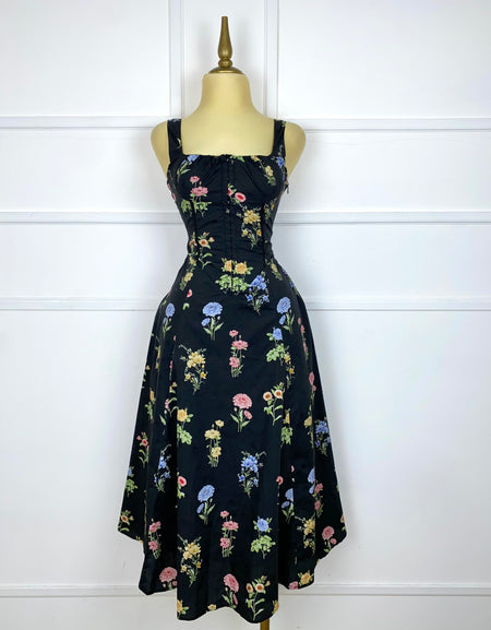 Vestido negro midi con flores